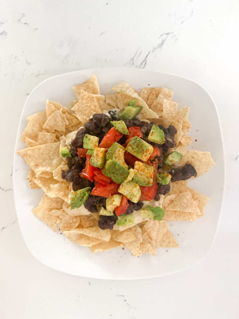 vegan dairy free nachos on white plate