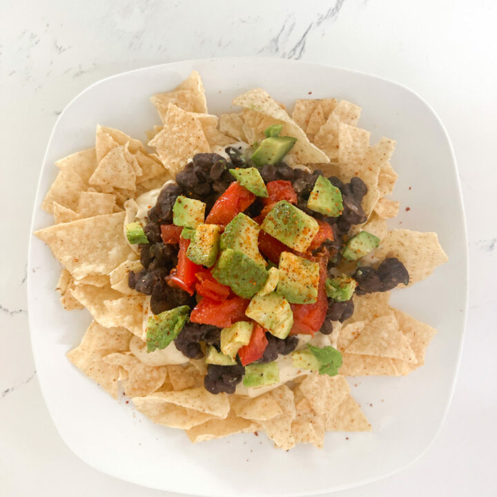 vegan dairy free nachos on white plate